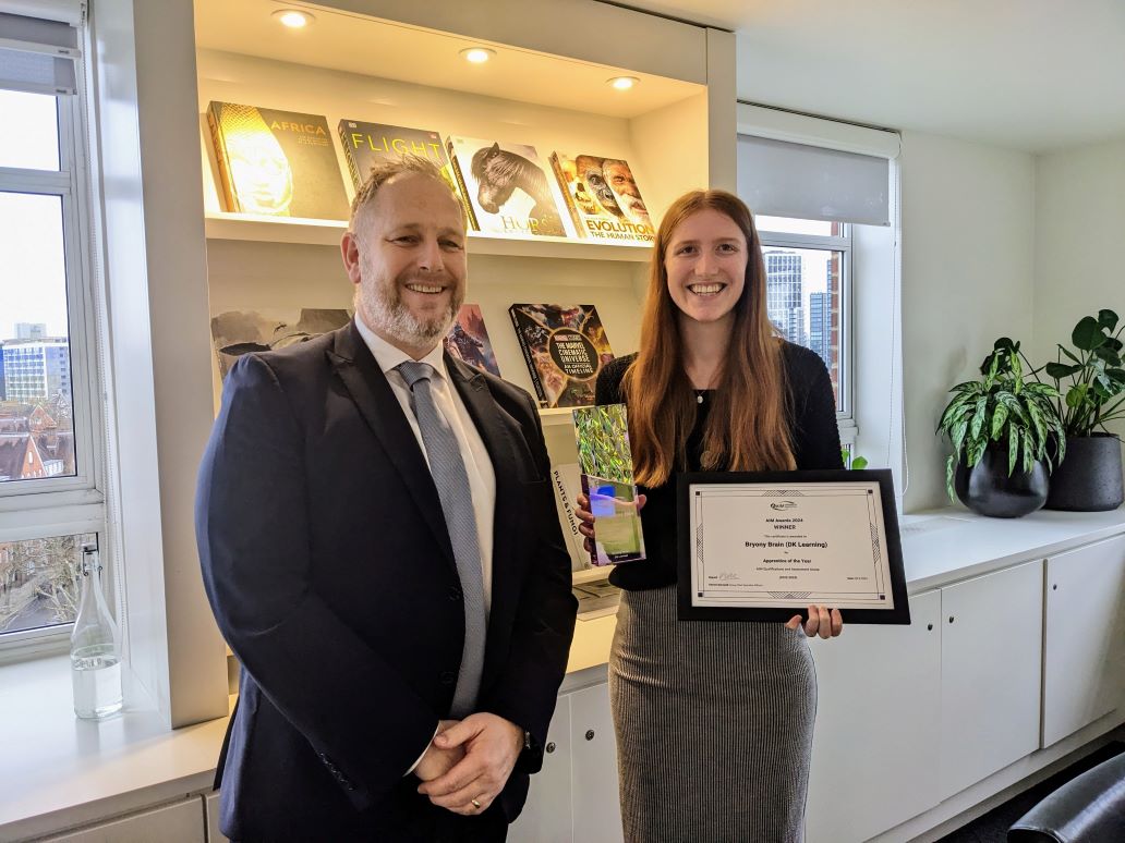AIM's Director of Strategic Growth and Service Excellence, Matt Evans, presenting Bryony with the award for Apprentice of the Year 2024.