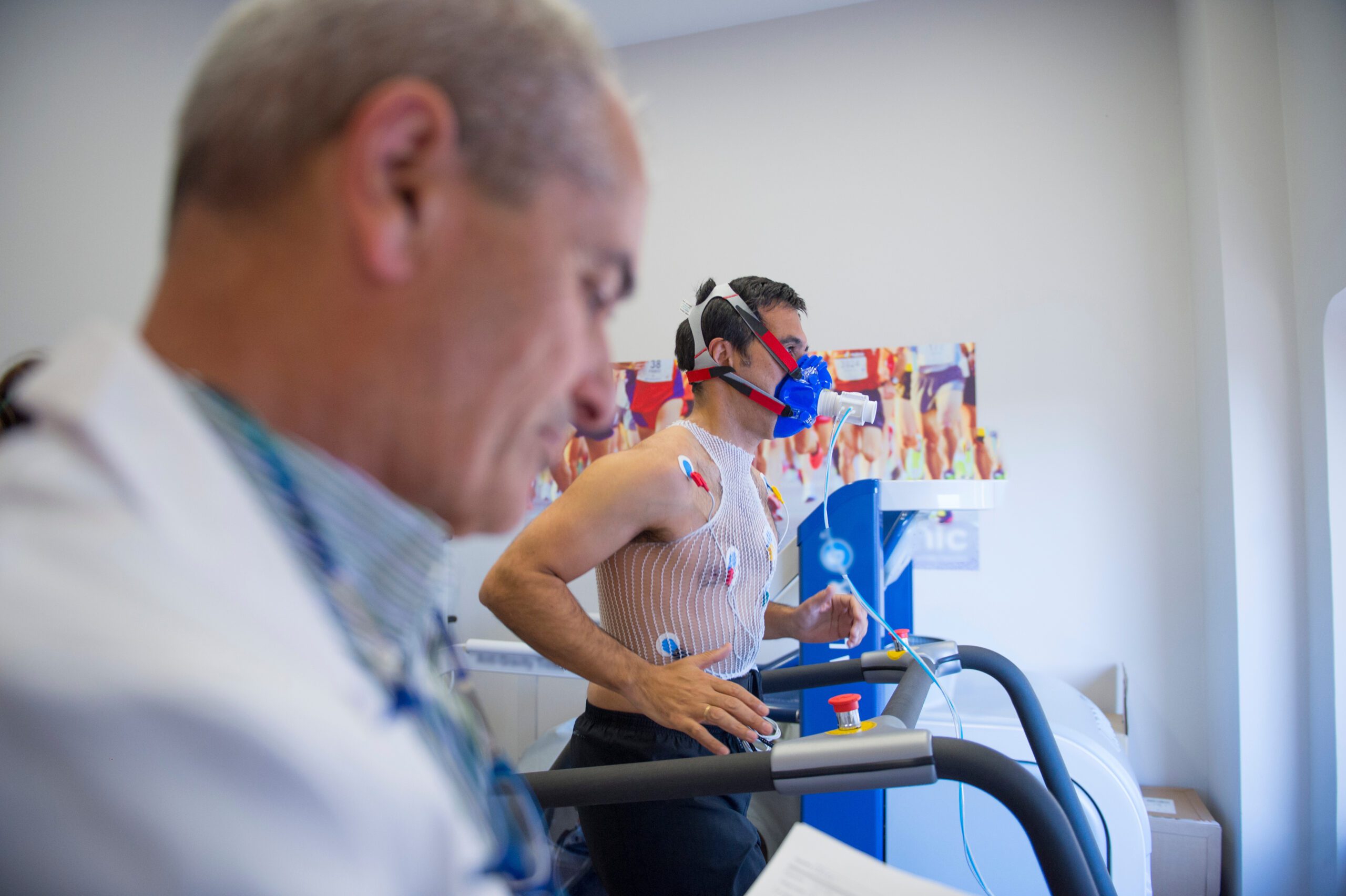 Man doing a stress test of the heart running on a machine